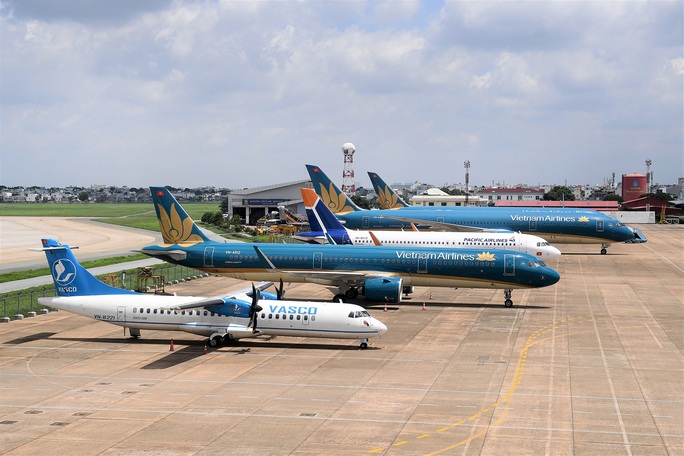 Cục Hàng không thu hồi loạt chuỗi slot tại sân bay Tân Sơn Nhất, Nội Bài - Ảnh 1.